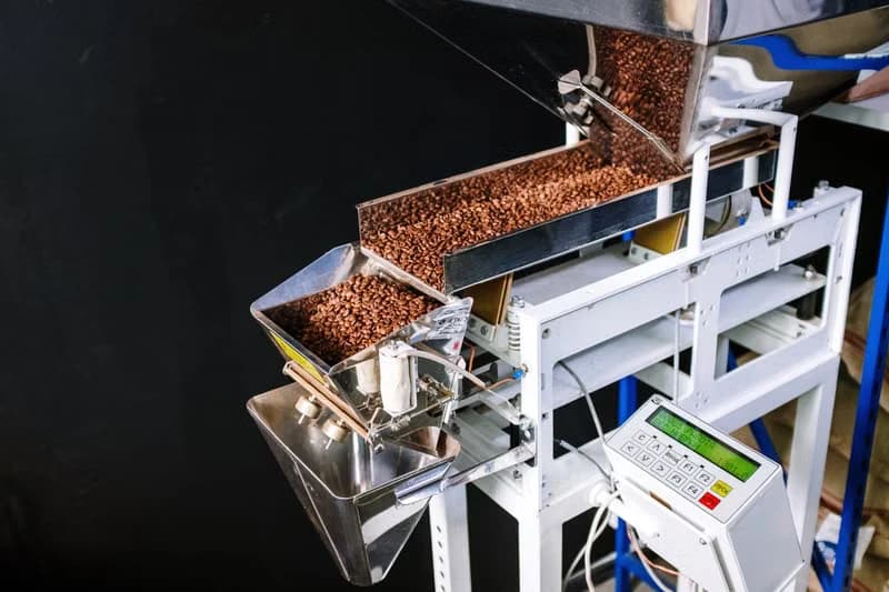 Automated machine sorting roasted coffee beans with a control panel